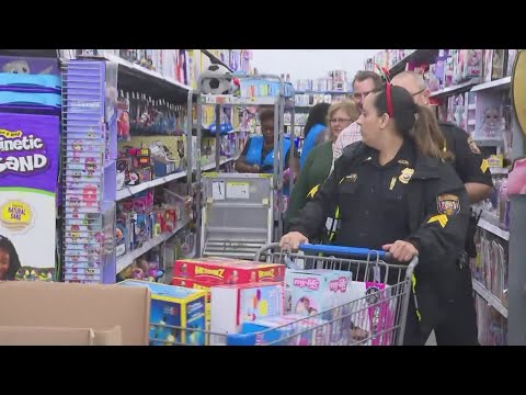 Hillsborough County school resource officers play Santa by toy shopping for students