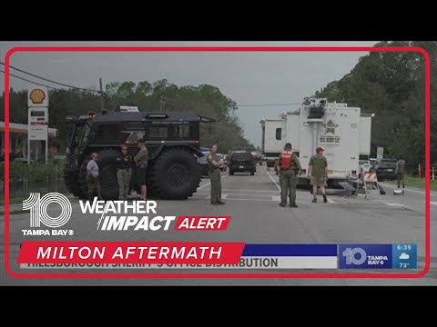 Hillsborough Sheriff&#39;s deputies helping to hang out supplies after Milton